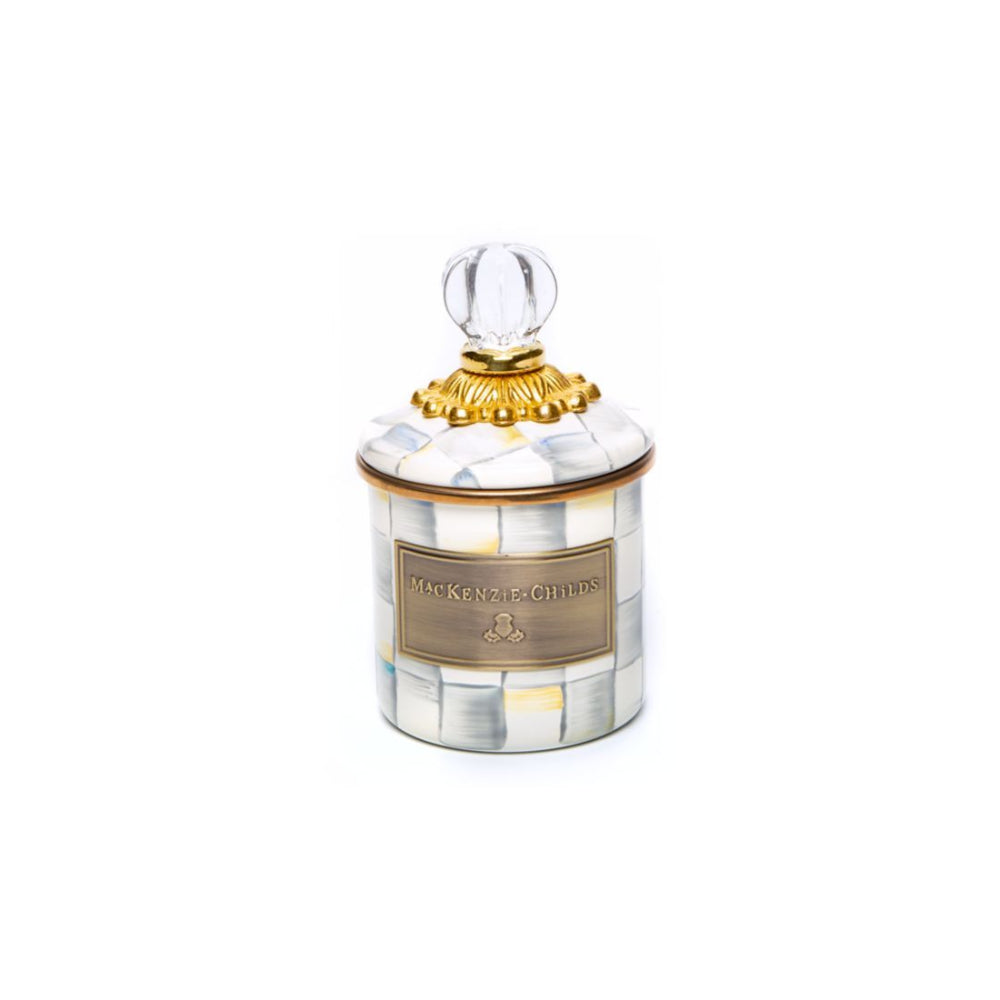 Mini sterling check canister on white background.