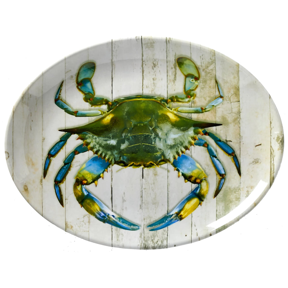 A round melamine platter featuring a whimsical depiction of a blue crab on a weathered white dock.