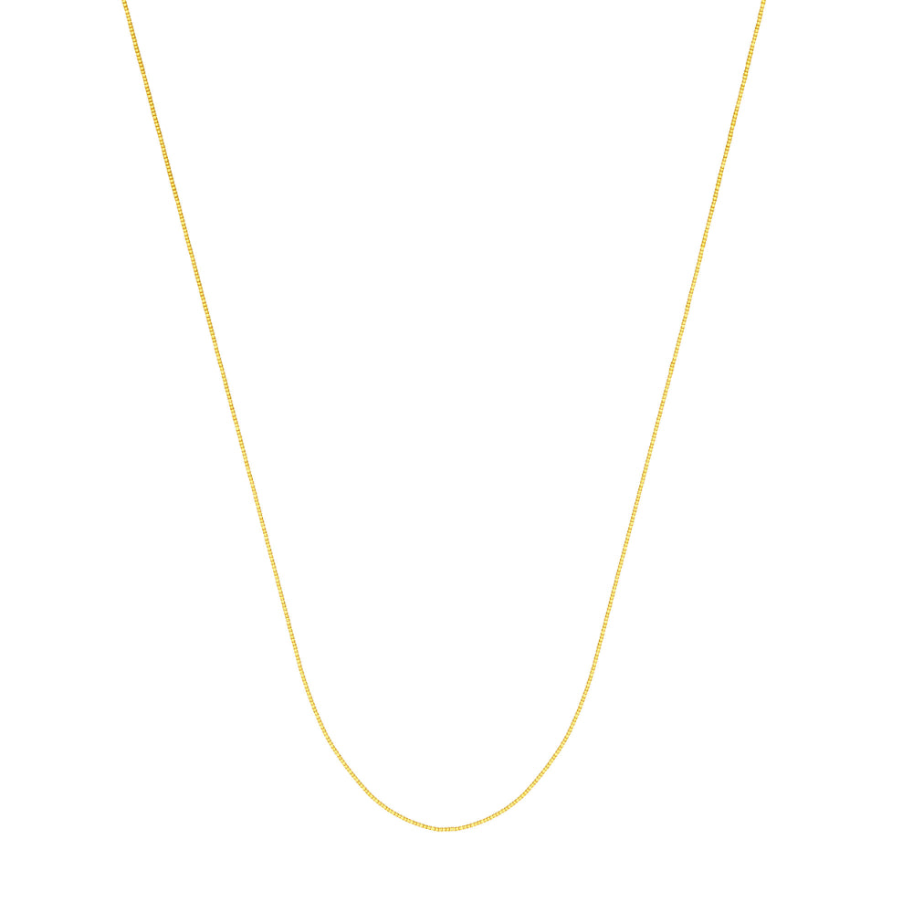A 14kt yellow gold box chain necklace laid out on a plain background.