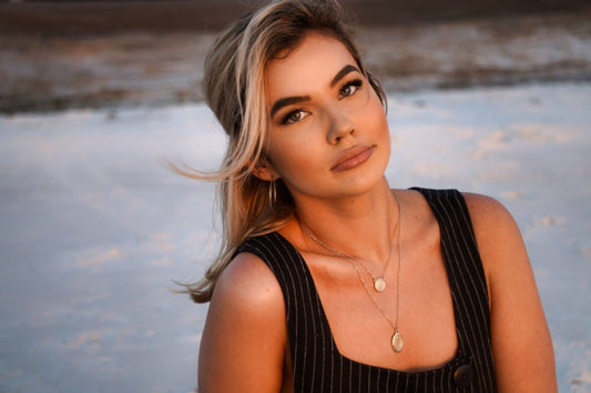 woman with two necklaces