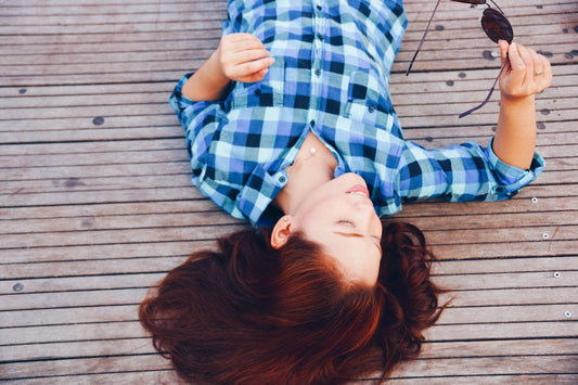 woman laying on deck