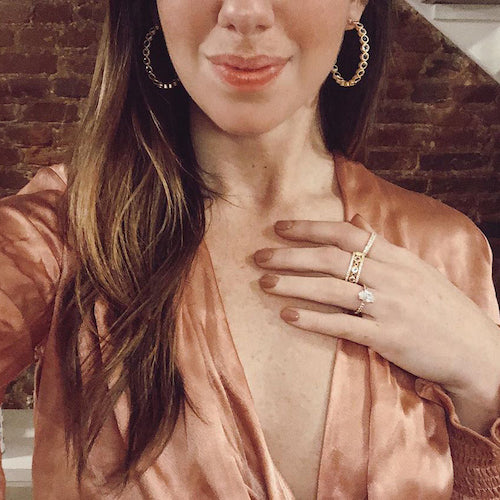 woman wearing three rings