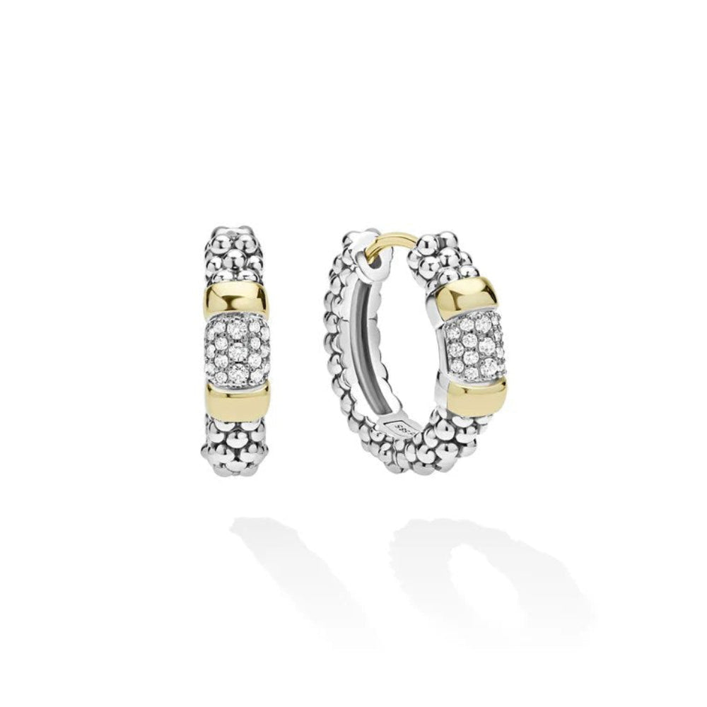 A pair of silver and yellow gold huggie hoop earrings with pavé-set clear stones and textured gold stations