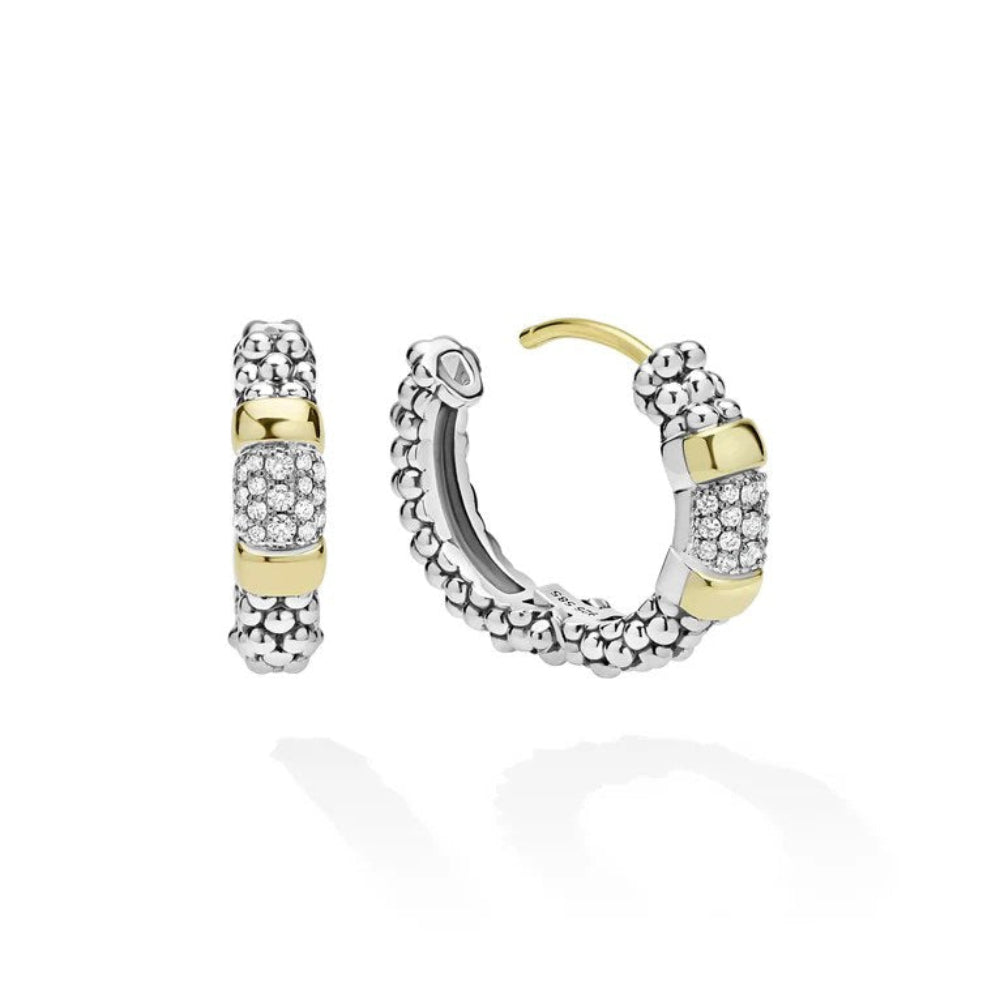 A pair of silver and yellow gold huggie hoop earrings with pavé-set clear stones and textured gold stations