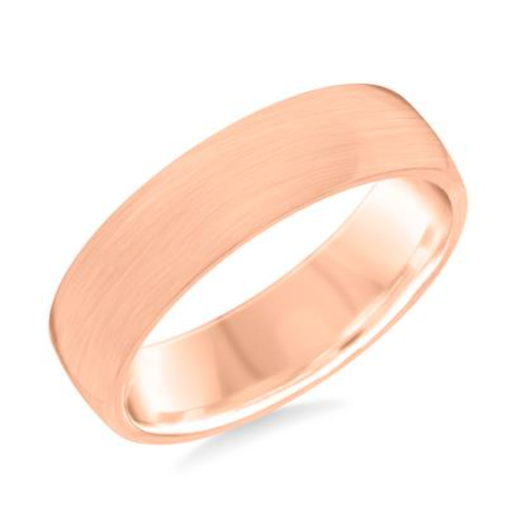 Rose gold ring on a white background
