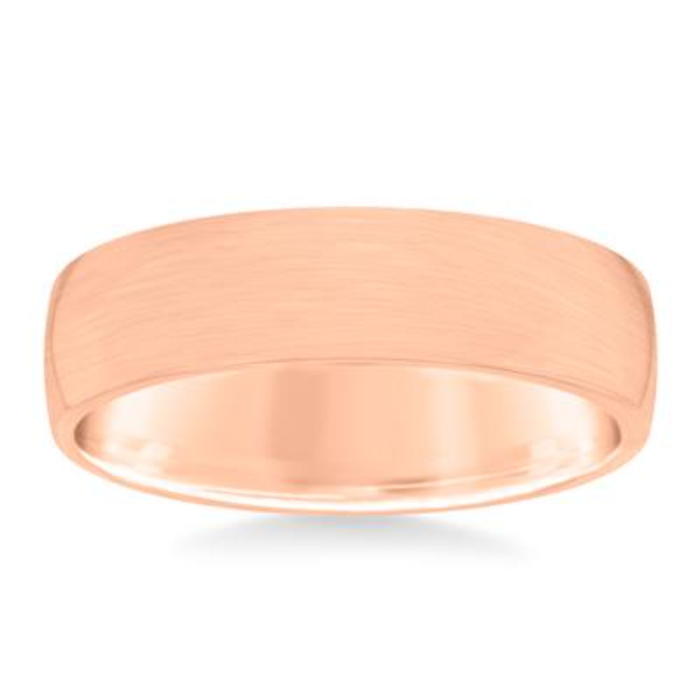 Rose gold ring on a white background