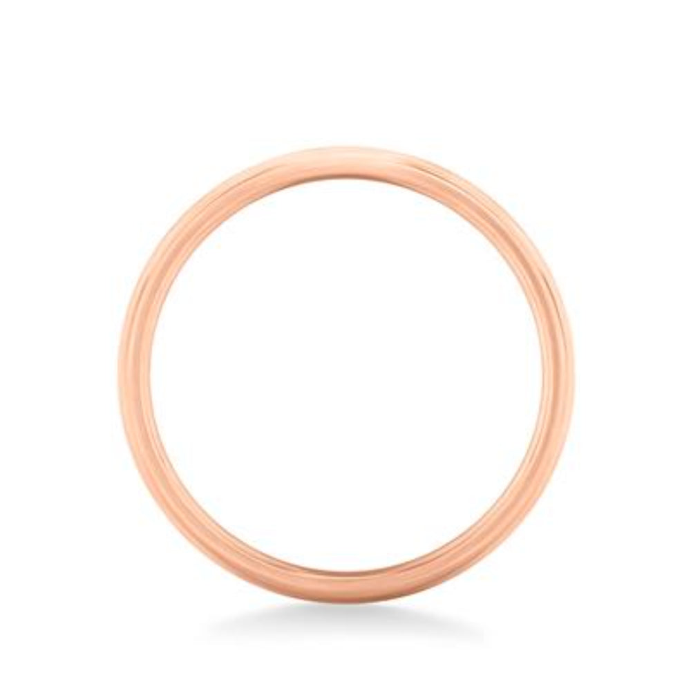 Rose gold ring on a white background