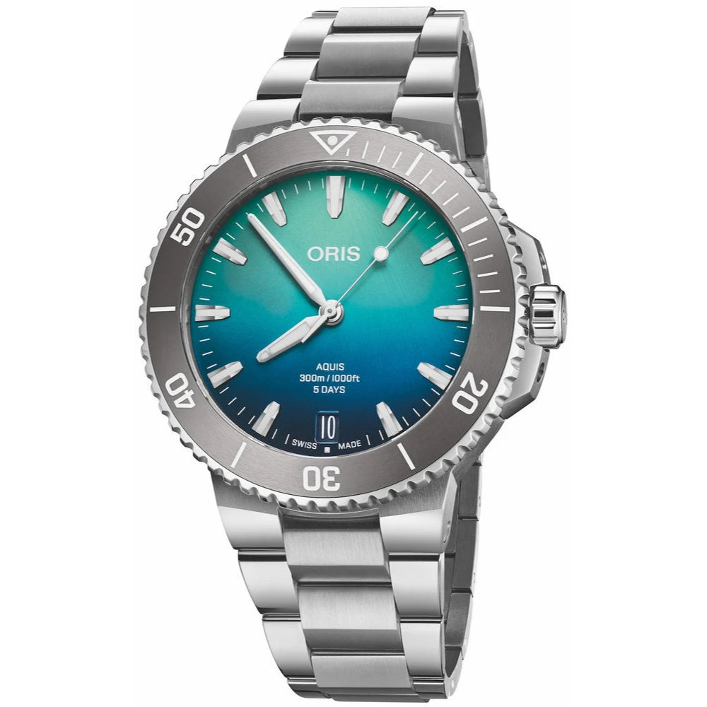 Oris Aquus watch with a silver stainless steel bracelet and case, featuring a blue-to-green gradient dial and a rotating bezel.