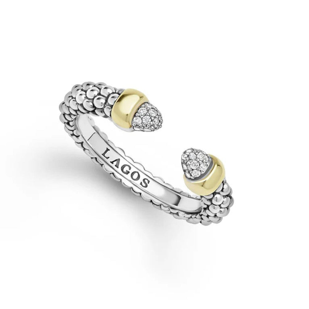 Sterling silver open cuff ring with a textured beaded exterior, two gold-toned heart-shaped end caps, and pavé-set clear stones on one side. 