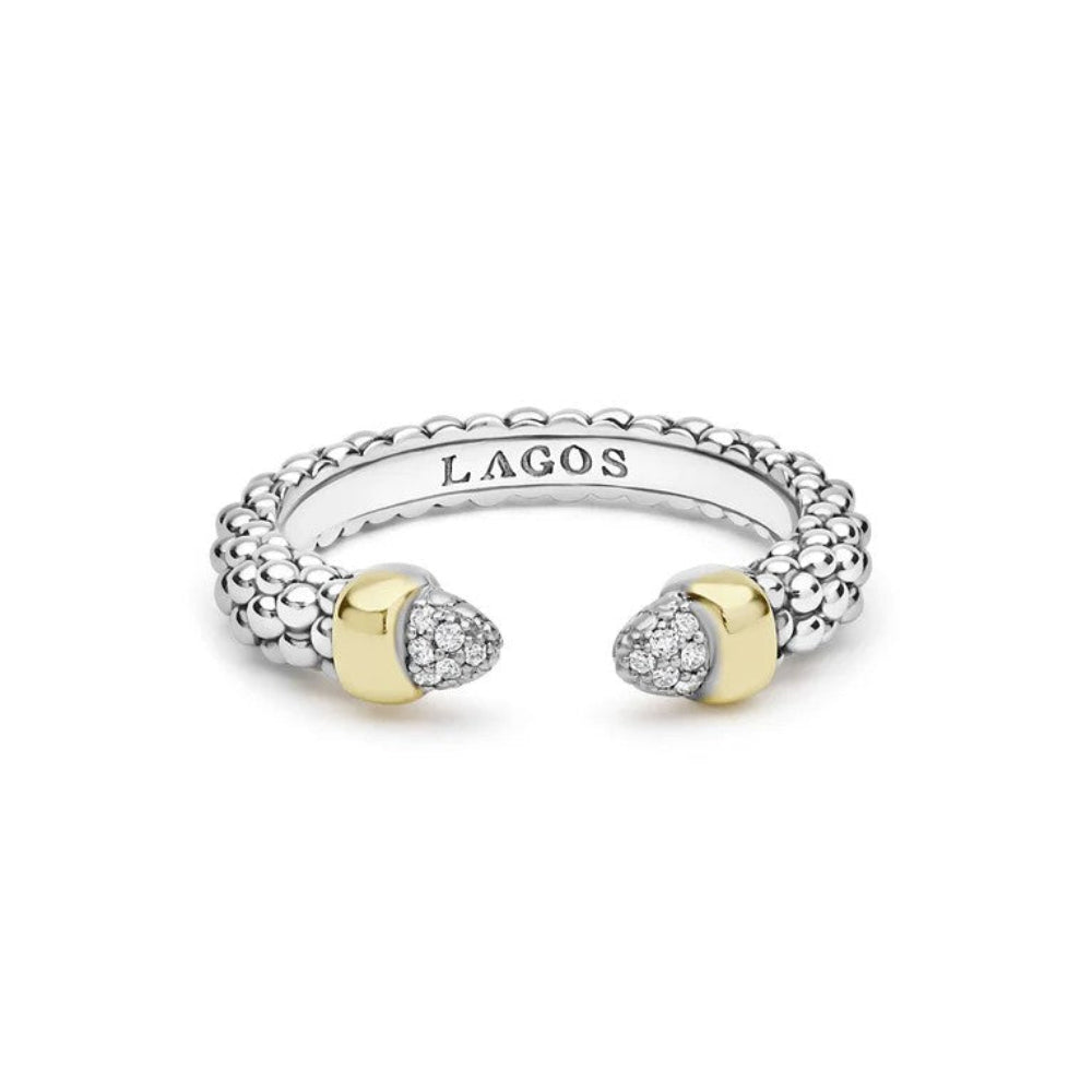 Sterling silver open cuff ring with a textured beaded exterior, two gold-toned heart-shaped end caps, and pavé-set clear stones on one side. 
