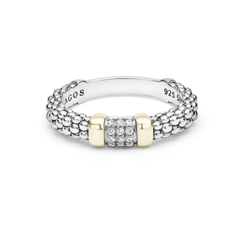 Sterling  silver ring with a textured beaded band, a central pavé diamond section, and two yellow gold cylindrical accents