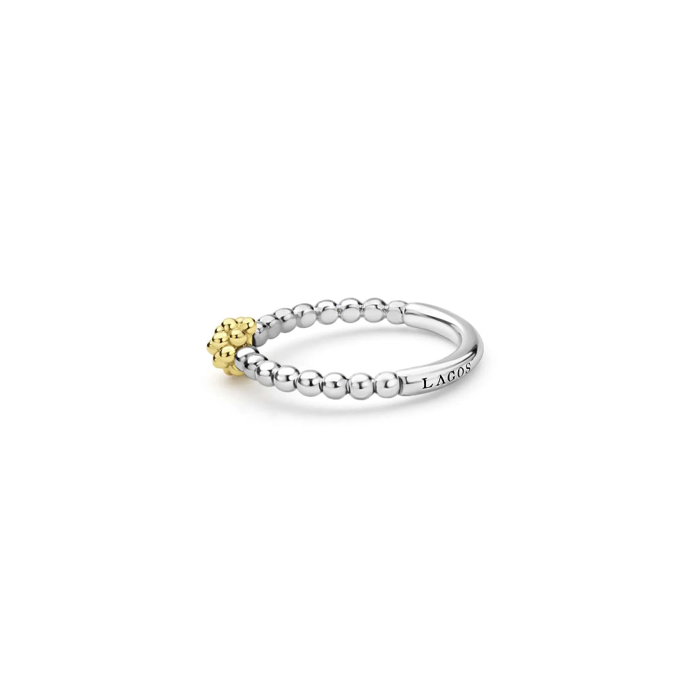 Side view if ring showing silver beading and 18 k gold centerpiece 