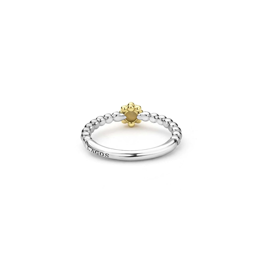 Signature silver beading on ring 
