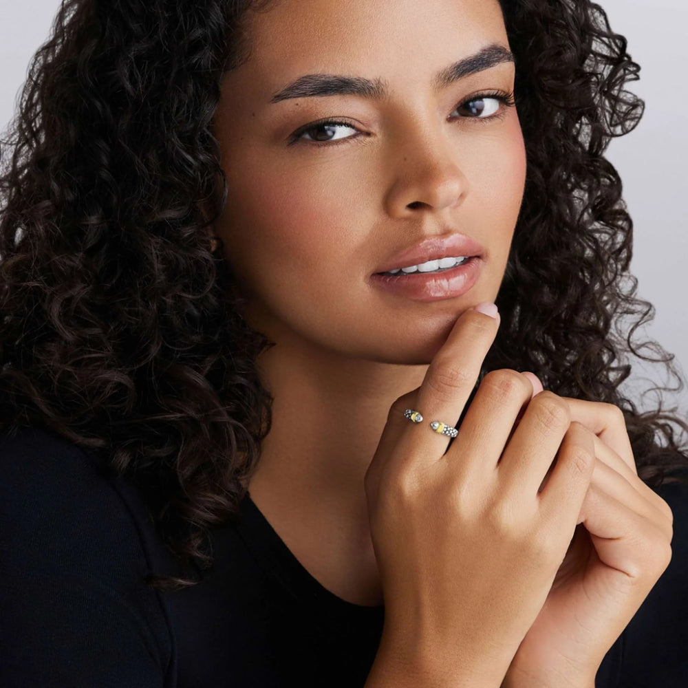 Woman wearing two tone ring 