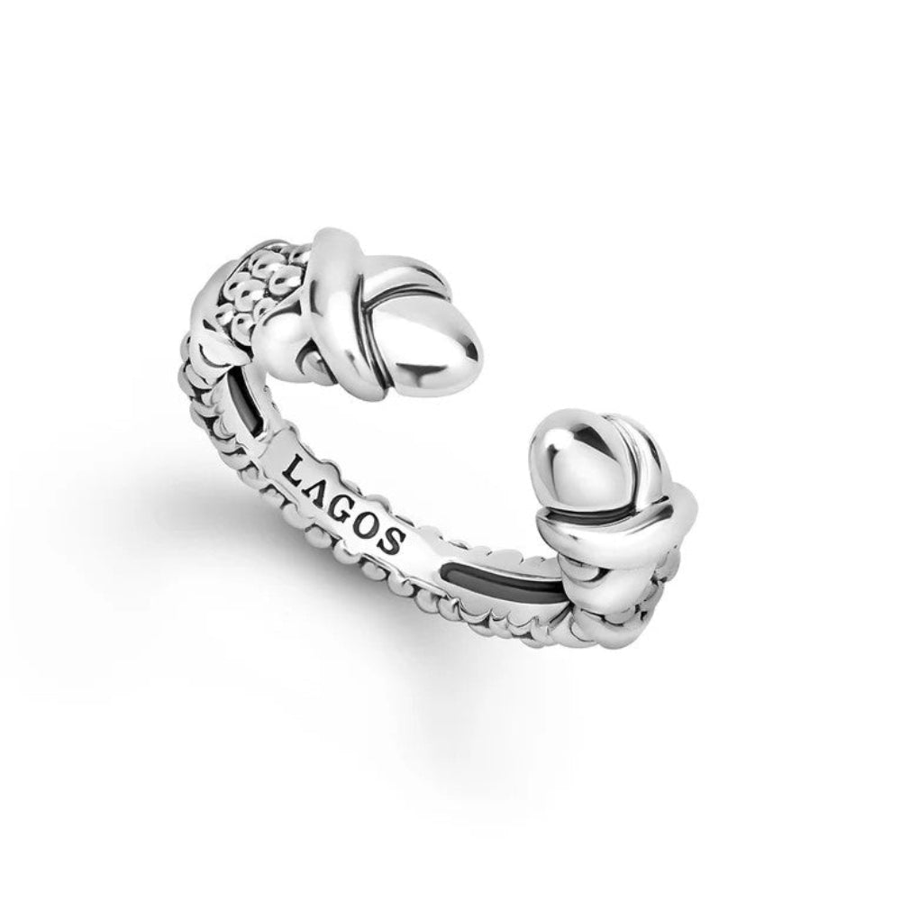 A sterling silver open cuff ring featuring "X" details on the ends 