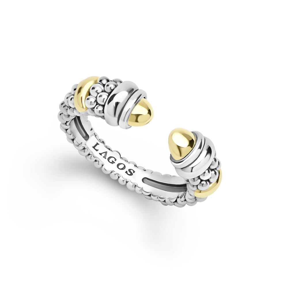 A silver-toned Lagos brand cuff ring with textured beaded details and polished gold-toned accents, shown on a clean white background.