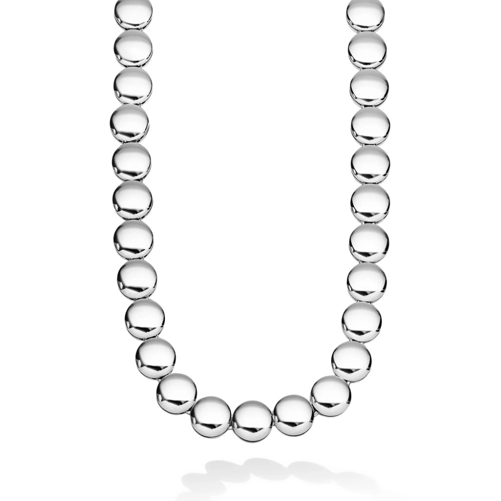 A polished silver beaded necklace arranged in a U-shape on a clean white background with a soft reflection below.