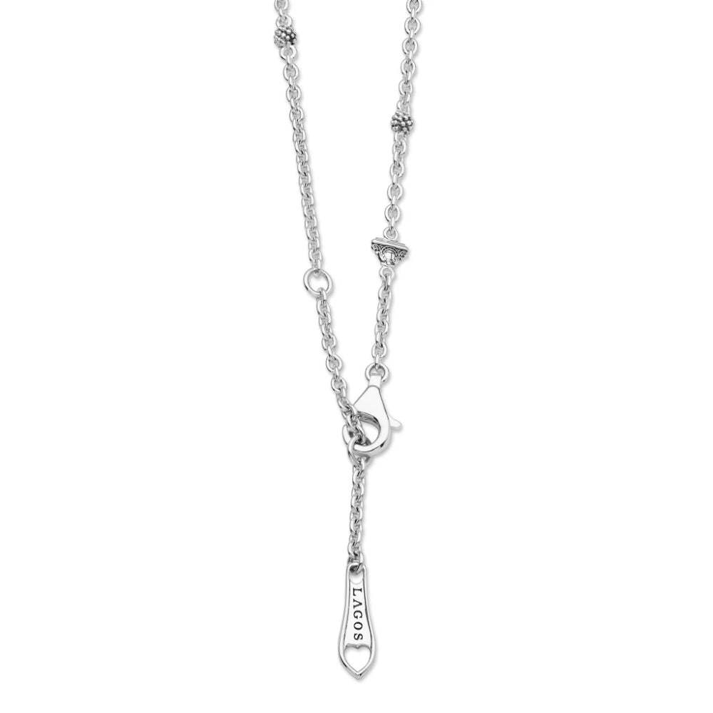 Silver-toned chain necklace with a lobster clasp and a dangling tag engraved with the brand name 'SOLARS'.