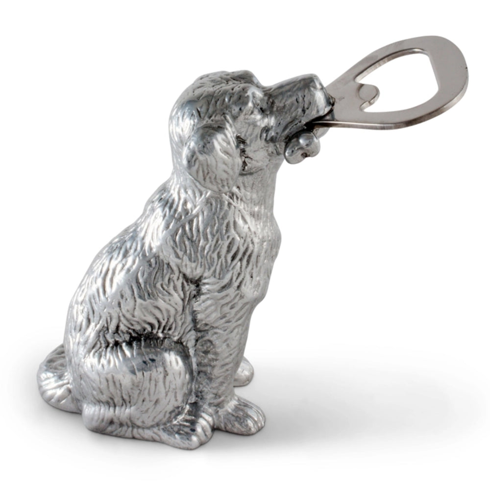 Silver dog-shaped bottle opener on a white background