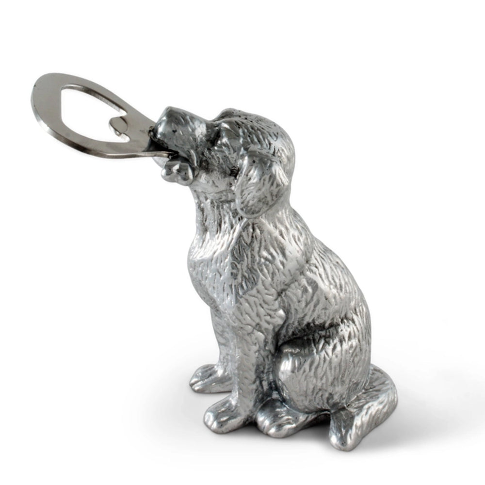 Silver dog-shaped bottle opener on a white background