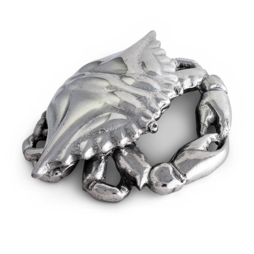 Silver crab-shaped object on a white background