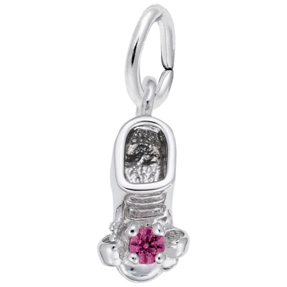 Silver baby-bootie charm with a pink gemstone on a white background