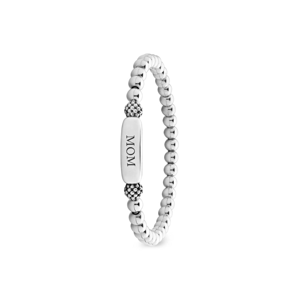 Silver beaded bracelet with a tag on a white background