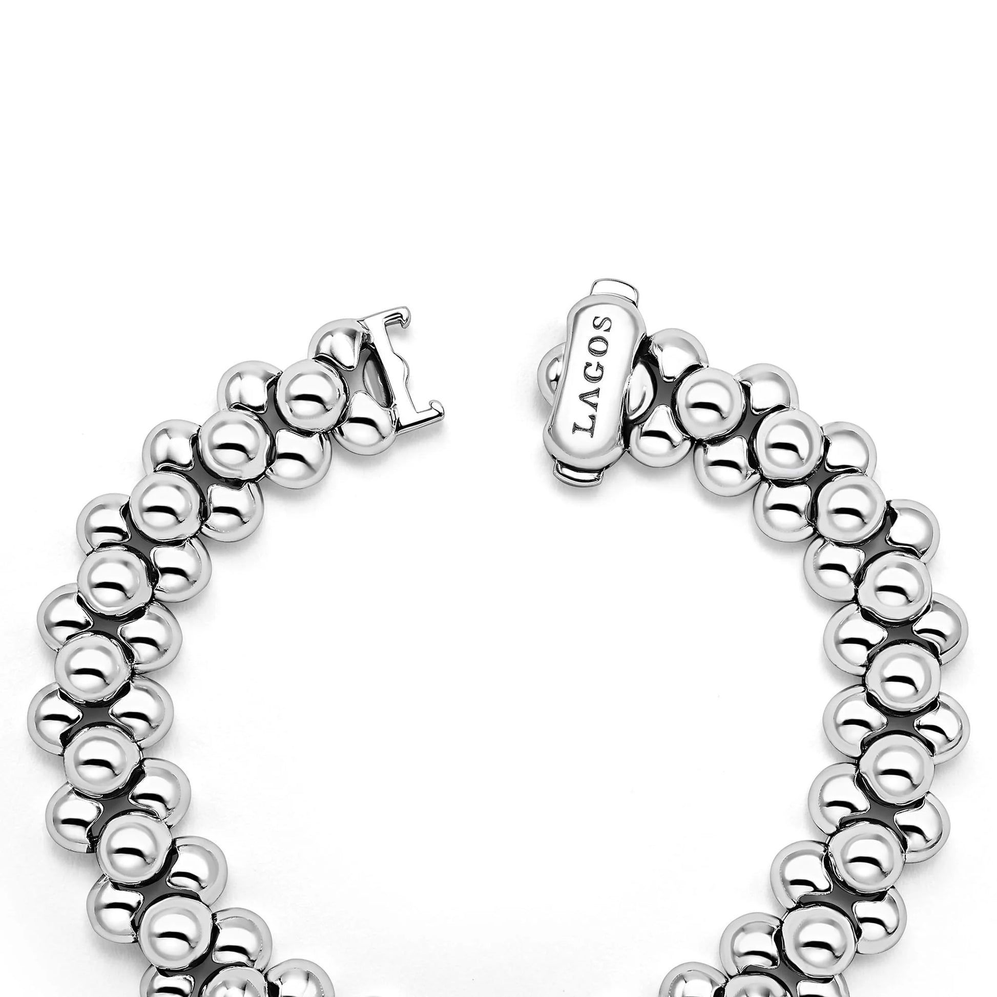 Silver bracelet with 'LAGOS' clasp on a white background