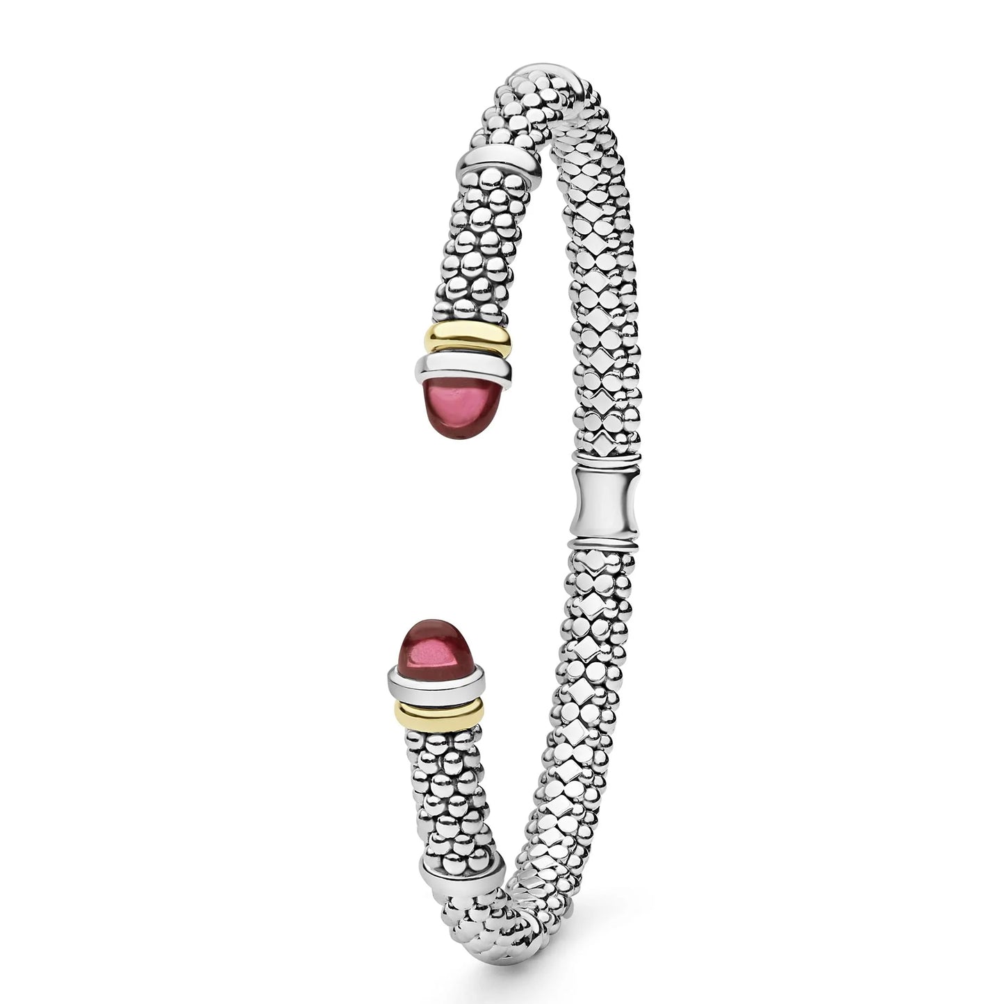 A silver-toned textured open cuff bracelet with two polished red gemstone end caps and small gold-toned accent rings, shown on a plain white background.