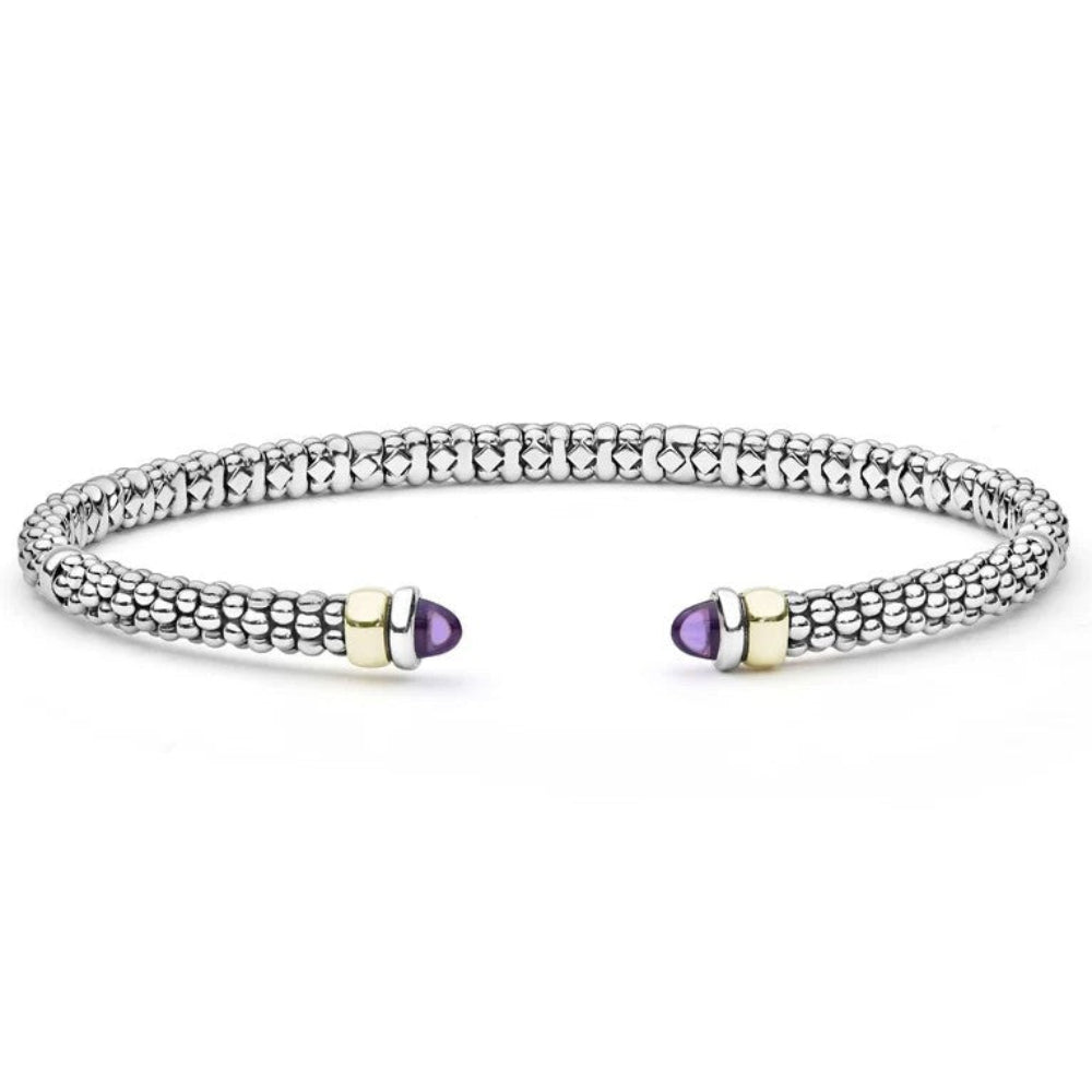 A Sterling silver textured beaded cuff bracelet with two gold-toned end caps, each featuring Amethyst end cabochons 