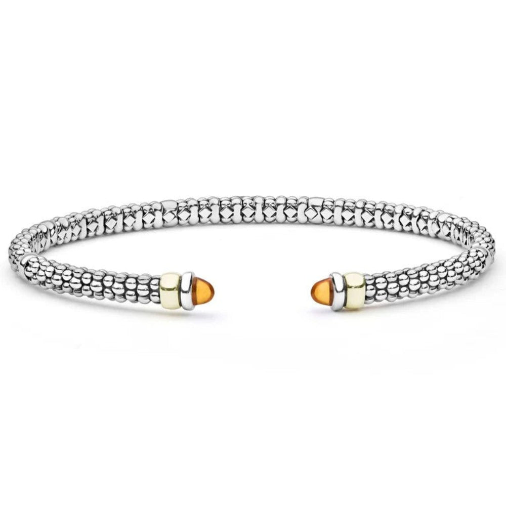 A Sterling silver textured beaded cuff bracelet with two gold-toned end caps, each featuring Citrine end cabochons 