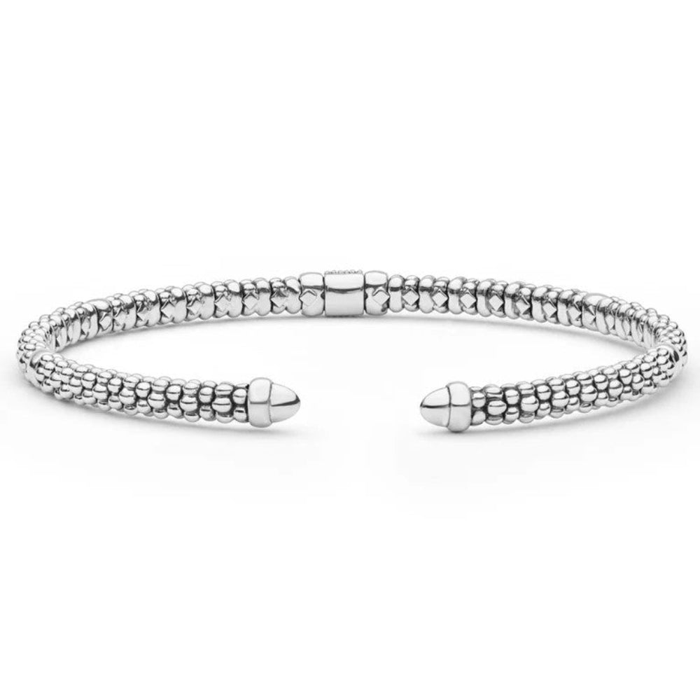 Sterling silver-textured cuff bracelet with a central yellow gold and diamond-set accent