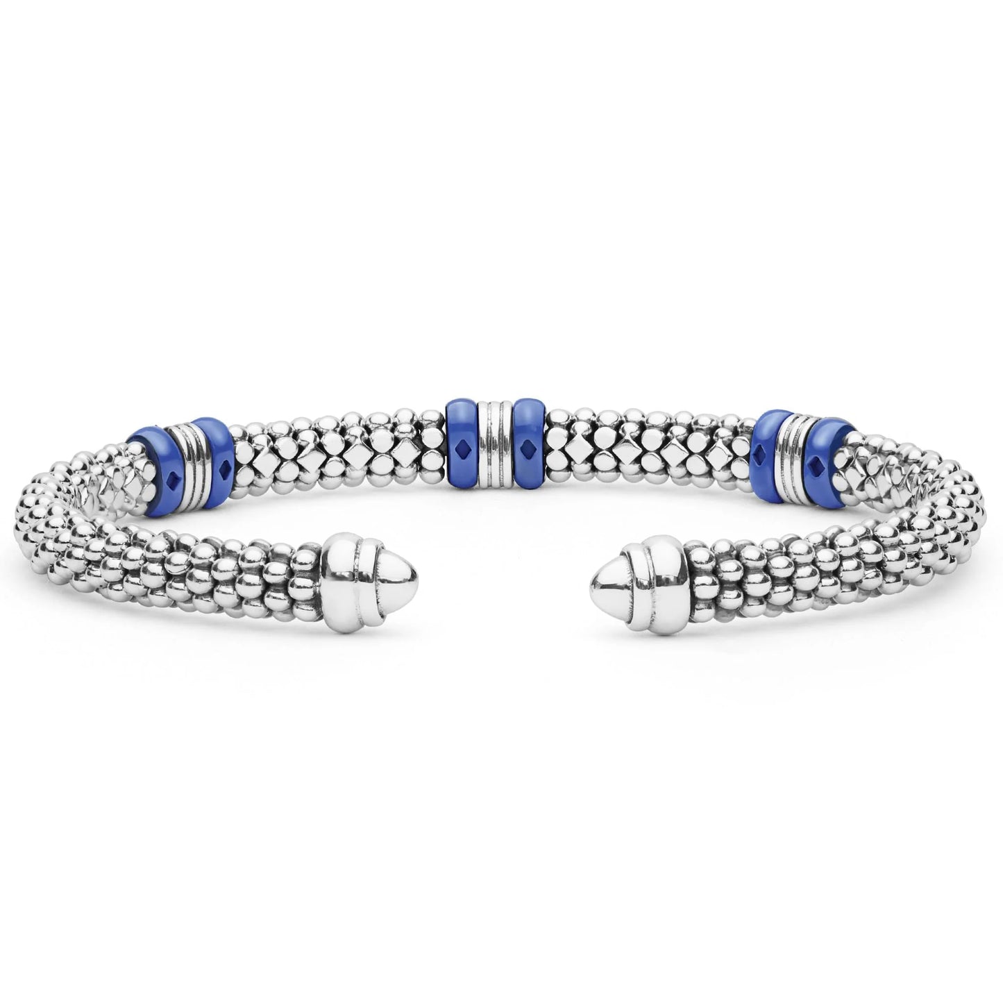 A silver-toned beaded cuff bracelet with three blue and silver spacer beads, displayed on a clean white background.