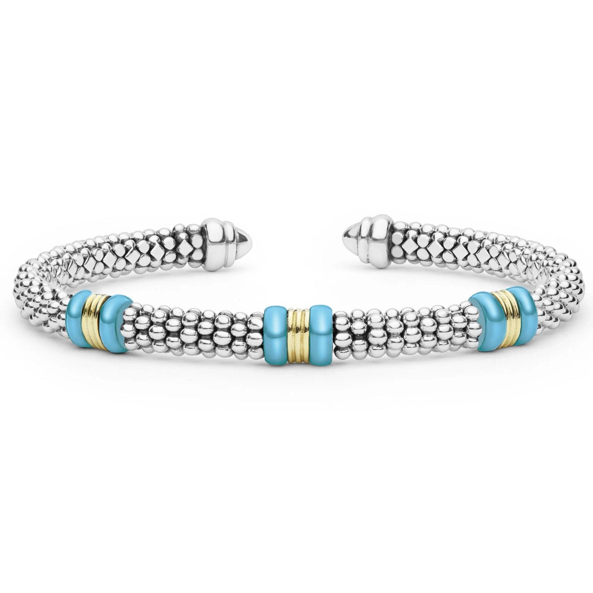 A silver-toned textured cuff bracelet with three light blue bead accents and thin gold spacer rings, shown on a plain white background.