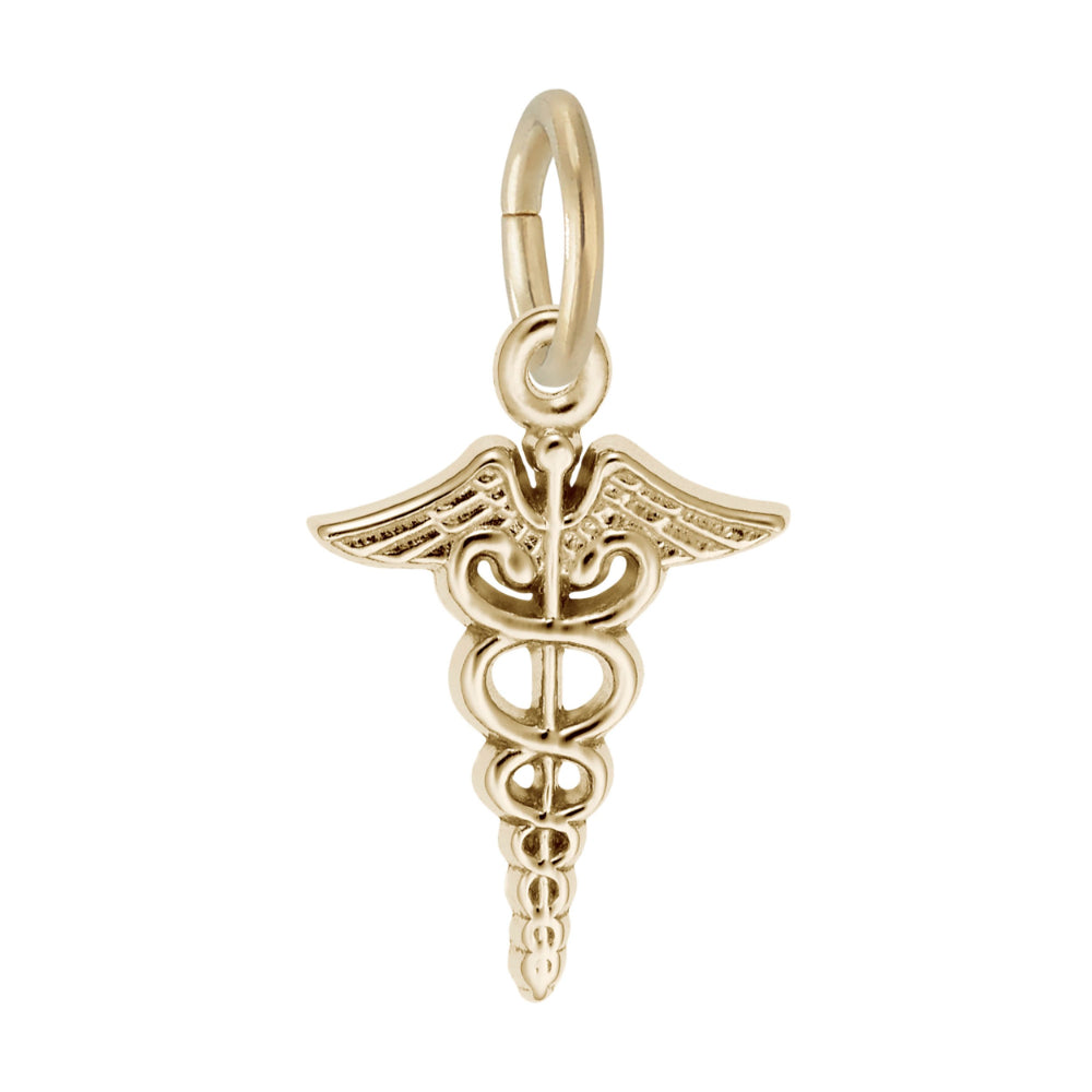 Gold caduceus charm on a white background