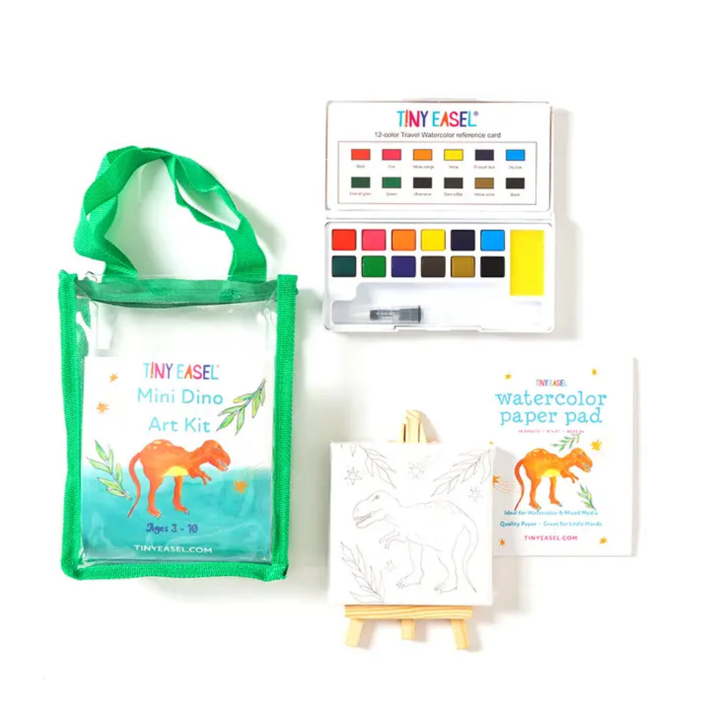 A mini dino art kit on a white background. 