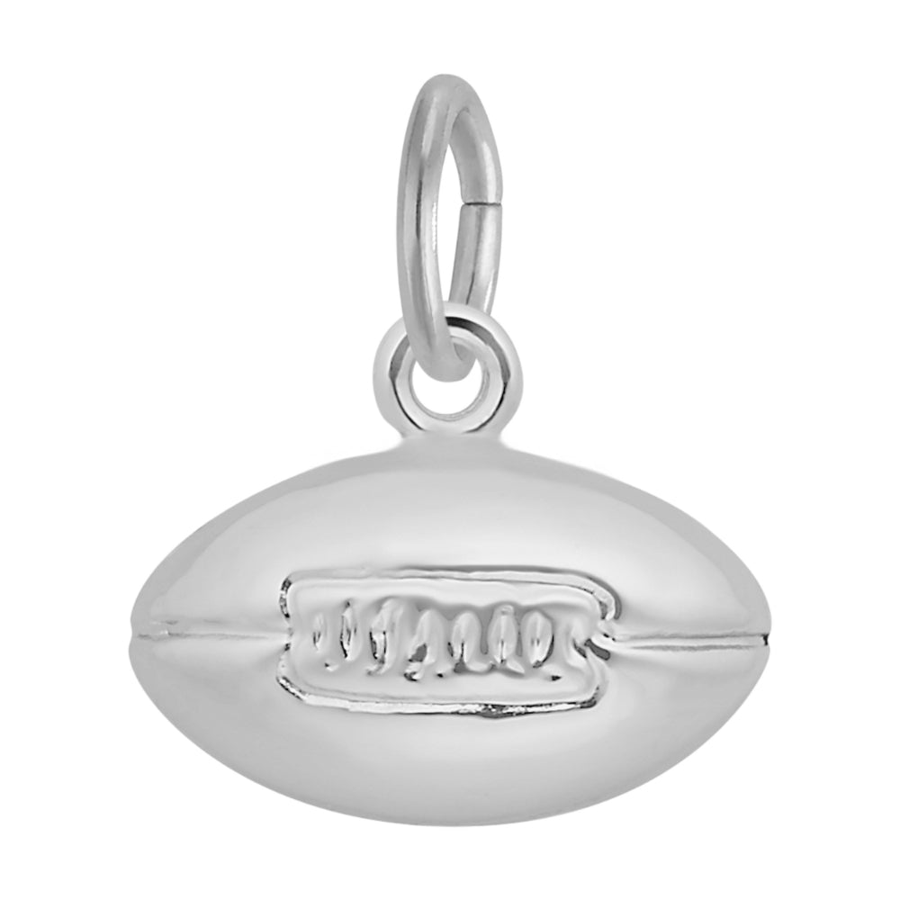 Silver football charm on a white background