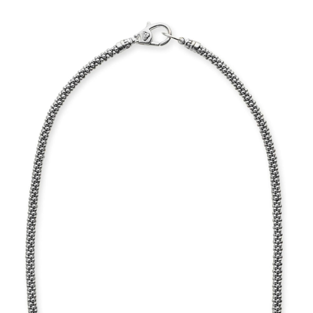 Silver chain necklace on a white background