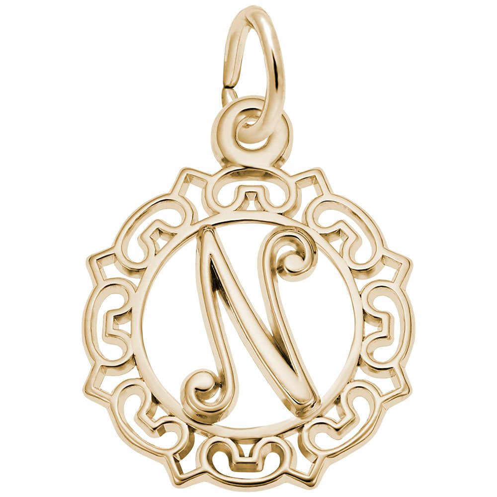 Gold N in an ornate boarder charm on a white background 