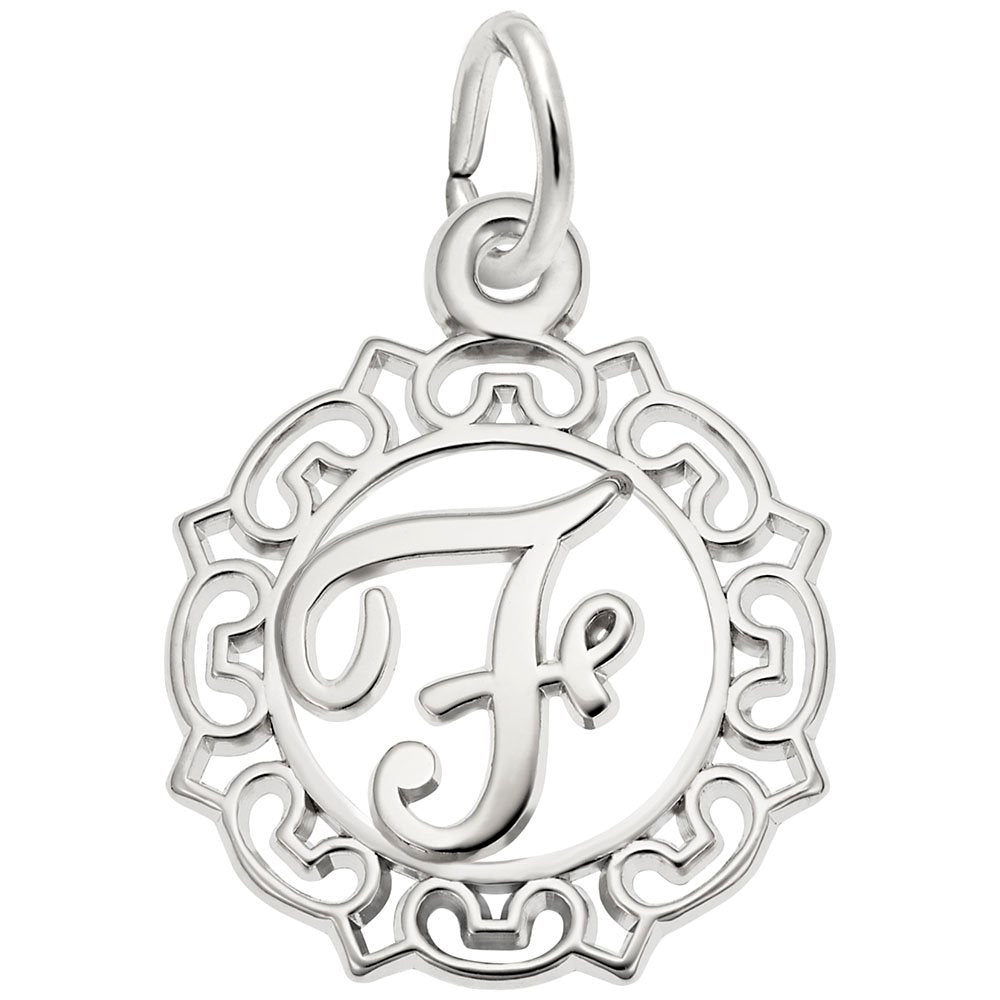 Silver F in an ornate boarder charm on a white background 
