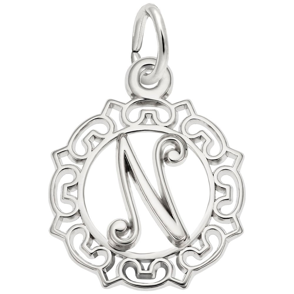 Silver N in an ornate boarder charm on a white background 