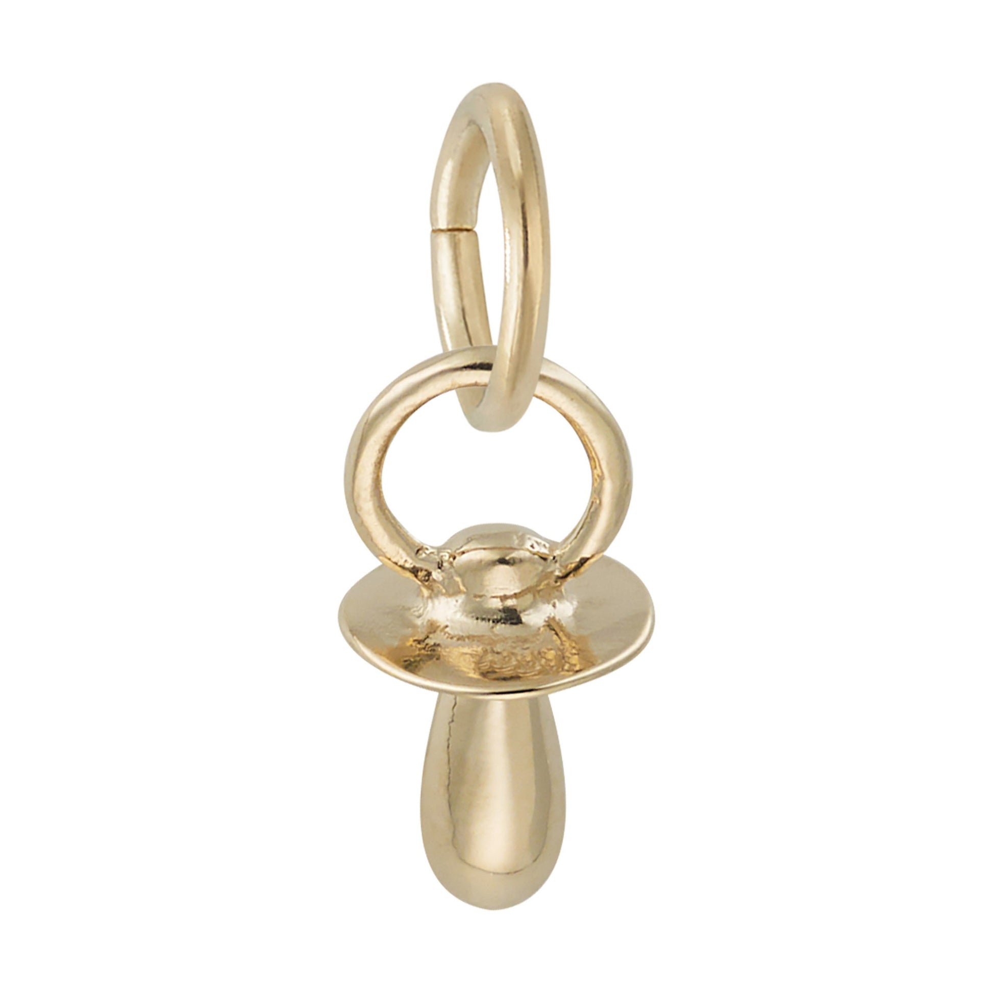 Gold pacifier charm on a white background