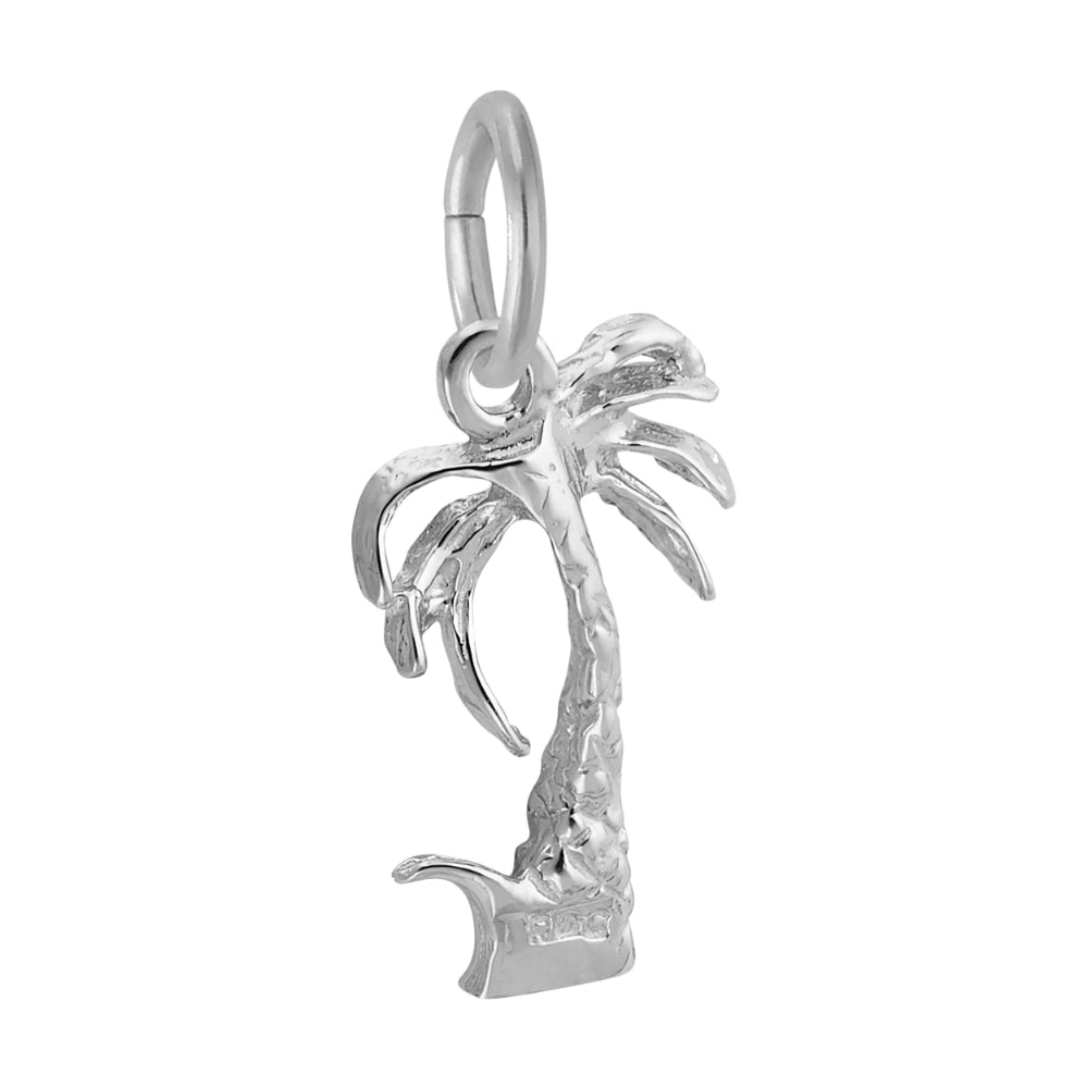 Reverse side of a Silver palm tree charm on a white background
