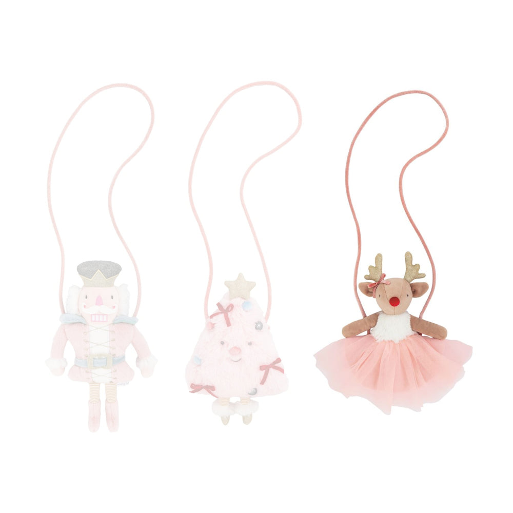 Reindeer plush purse with a pink tutu on awhite background.