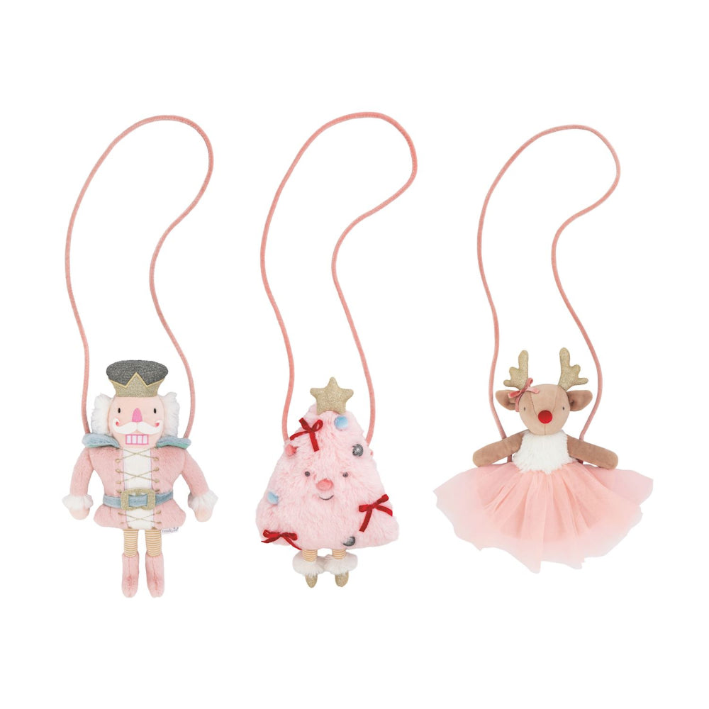 Three plush purses: a nutcracker, a Christmas tree, and a reindeer, on a white background.