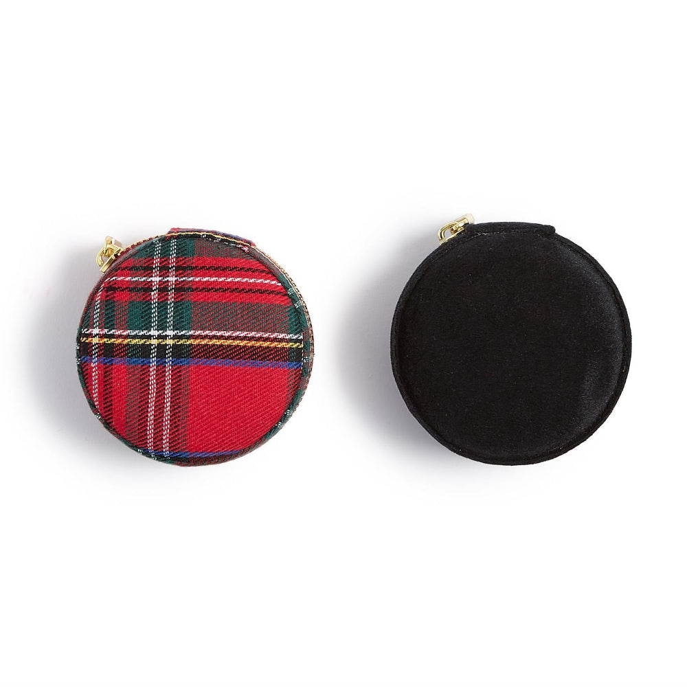 A photo showing the top of a black and red plaid velvet jewelry boxes with gold zippers a white background.