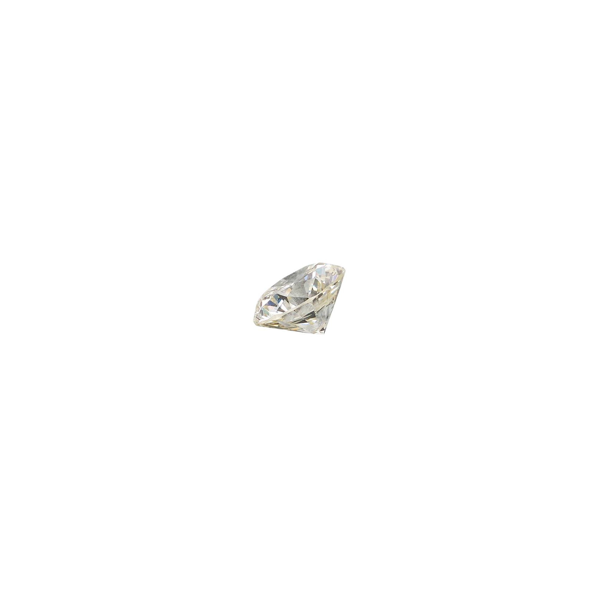 Round .95 carat diamond graded LVS1 on a white background