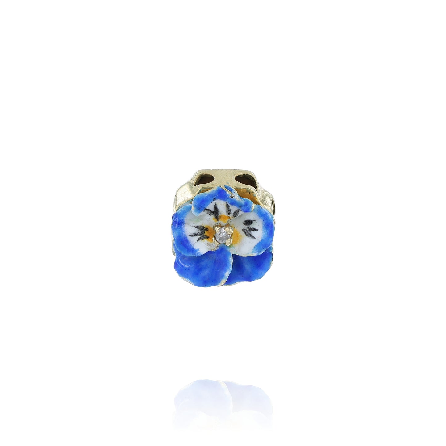 Yellow gold slide pendant with a multi-color enamel and diamond flower in front on a white background