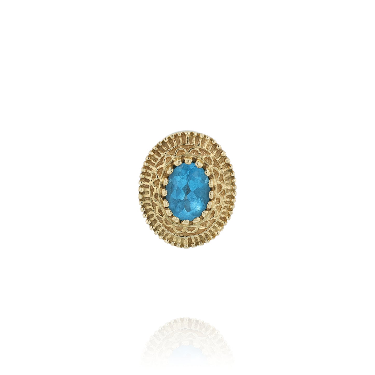 Yellow gold oval blue topaz slide charm pendant with a textured front on a white background