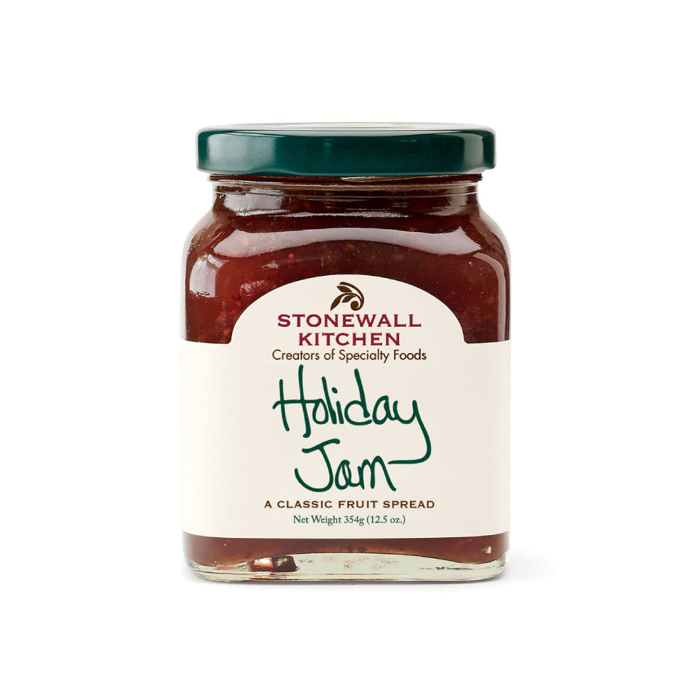 Stonewall kitchen holiday red jam jar on a white backround. 